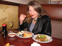 photo of Denise eating Asian meal