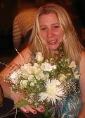 photo of Cindy holdig a bouquet